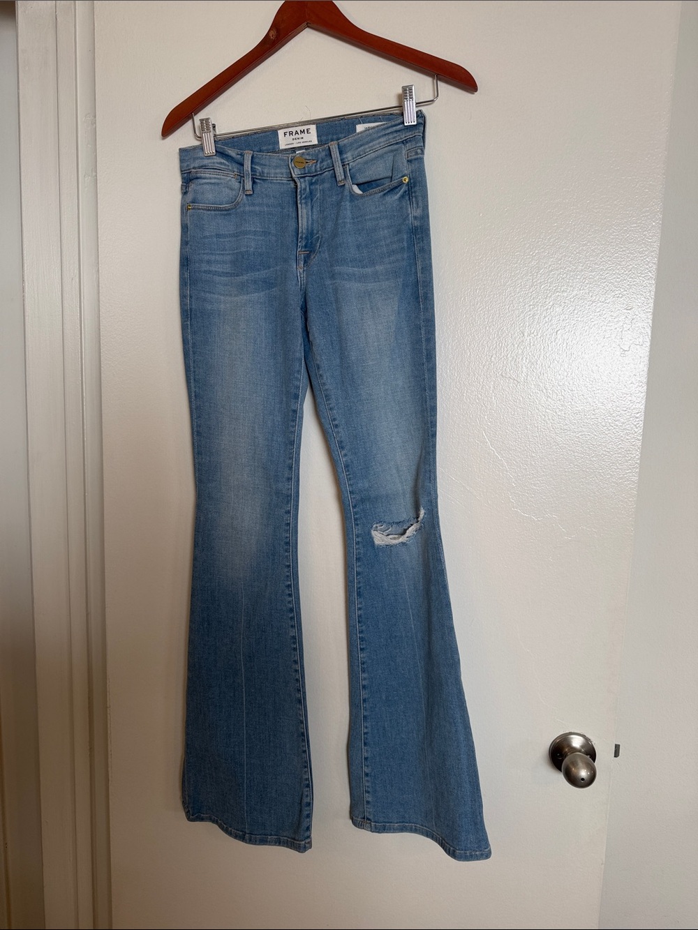 Frame Denim Light Blue Flare Jeans with Knee Rip